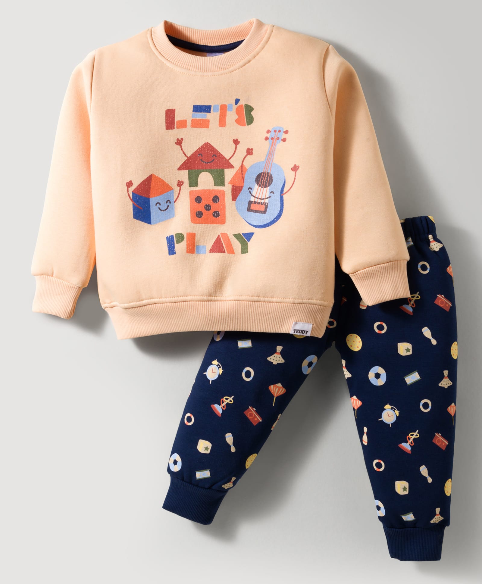 Teddy Fleece Knit Full Sleeves Winter Wear Night Suit With Guitar Print - Peach