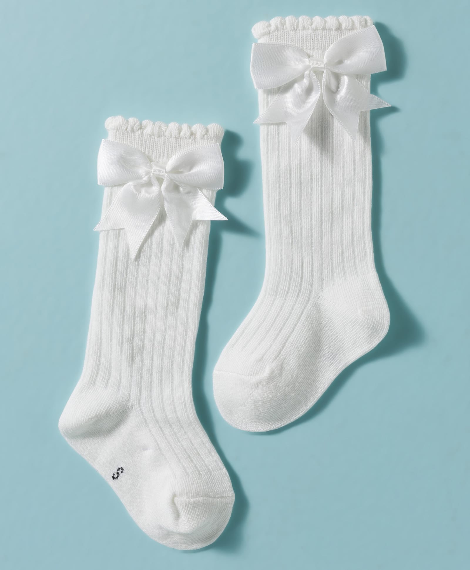Cute Walk by Babyhug Non Terry Knit Calf Length Solid Party Socks with Bow Applique & Cable Knit Design - White-image-10