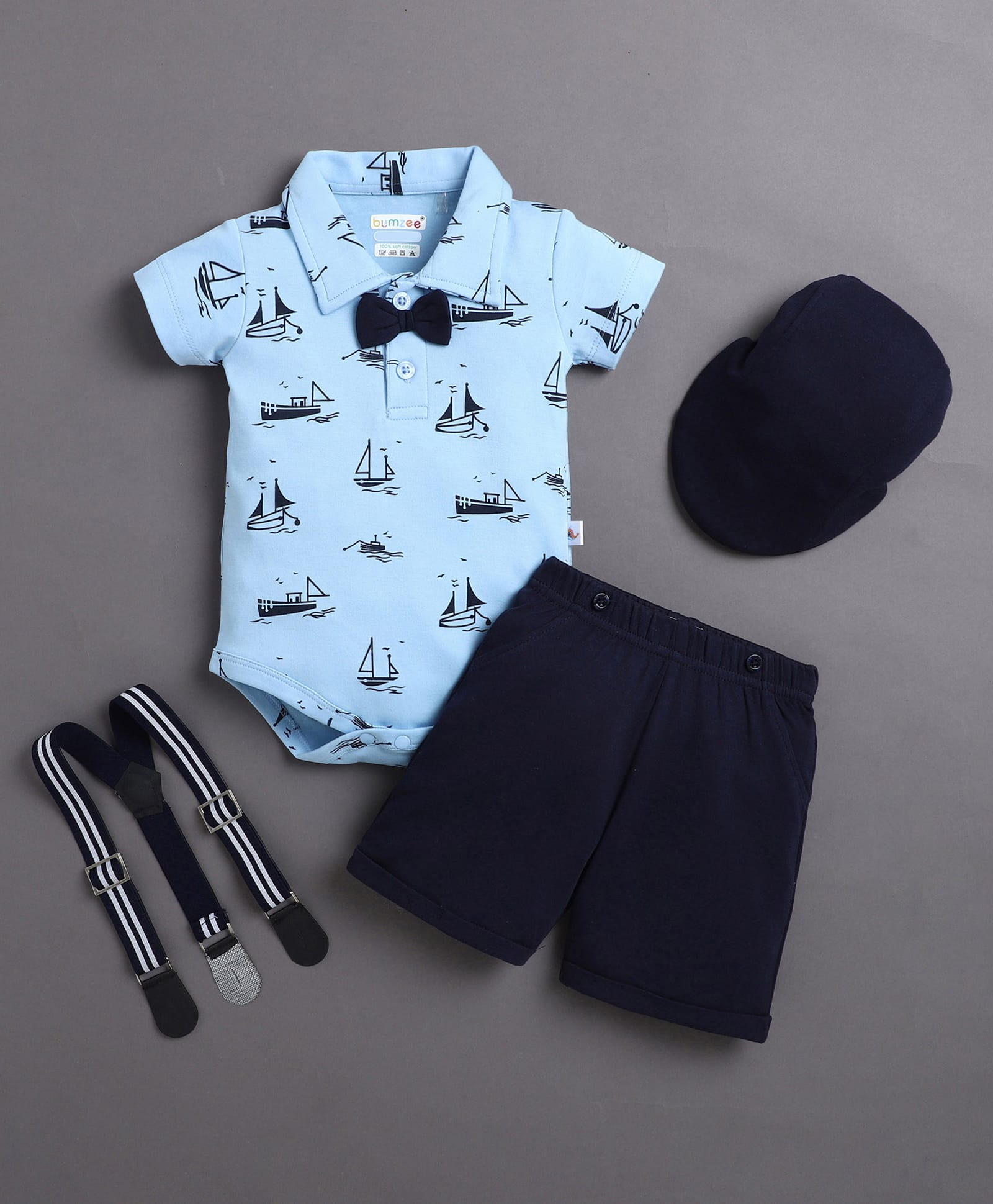 BUMZEE Cotton Knit Half Sleeves Sailboat Printed Onesie & Shorts With Suspender Cap & Bow - Light & Navy Blue-image-28