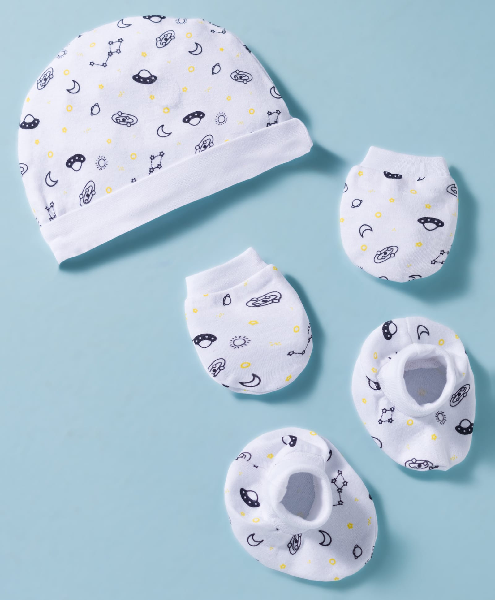 Rupa Peek A Boo Single Jersey Knit Unisex Cap, Mitten & Booties Set With Black Space Print White - Diameter 12.5 cm