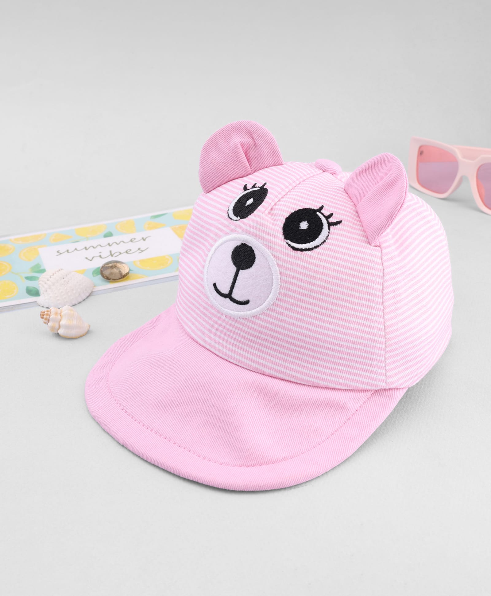 Babyhug Cotton Knit Baseball Cap With Face Embroidery & Ear Applique Pink - Diameter 15 cm