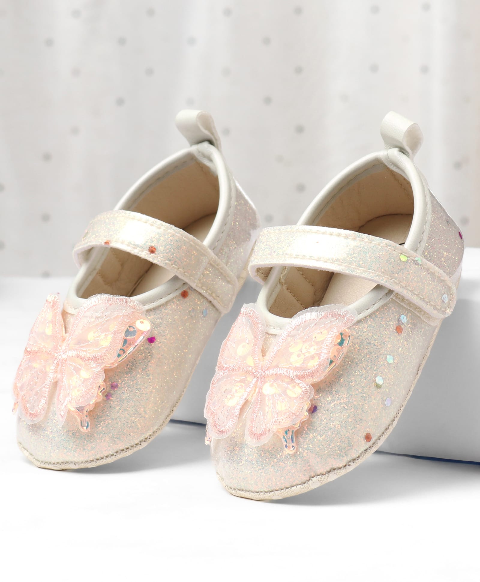 Cute Walk by Babyhug Velcro Closure Butterfly Sequinned Booties With Glitter - Beige