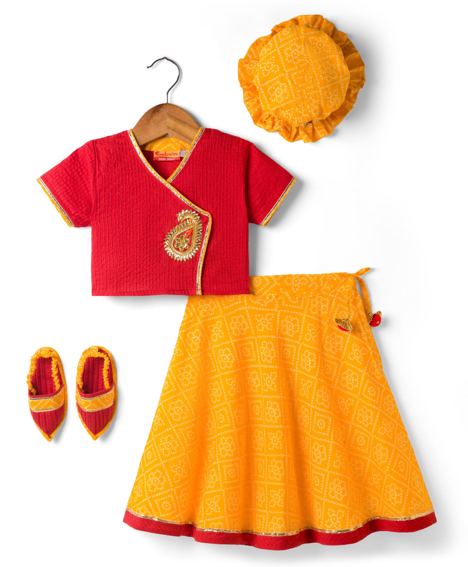 Exclusive from Jaipur Cotton Woven Half Sleeves Choli Lehenga With Cap & Mojaris with Bandhani Print - Yellow & Red-image-0