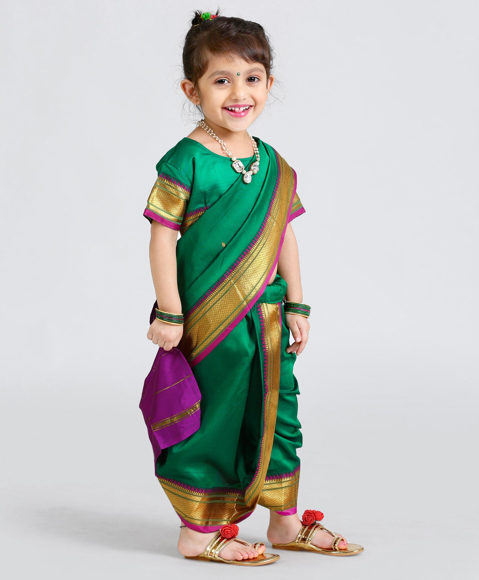 small baby girl in saree