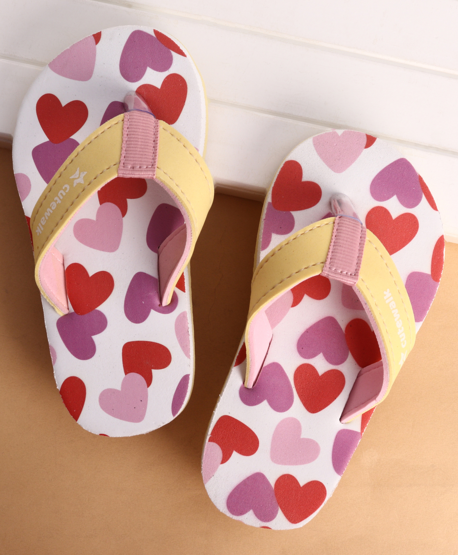cute walk by babyhug slip on closure flip flops with heart print - pink