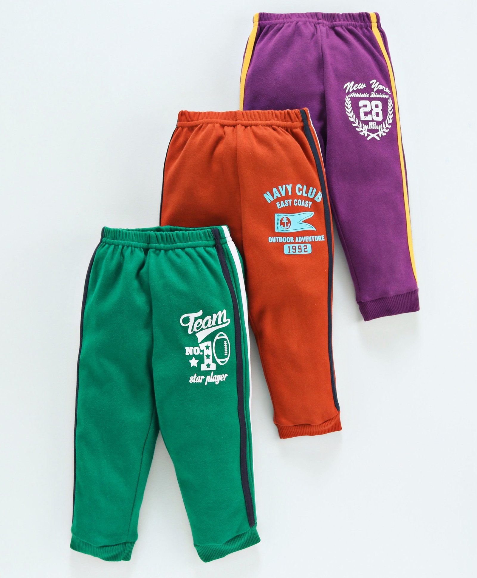 green and orange track pants