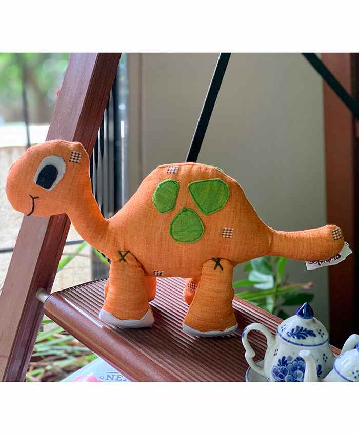 orange dinosaur soft toy